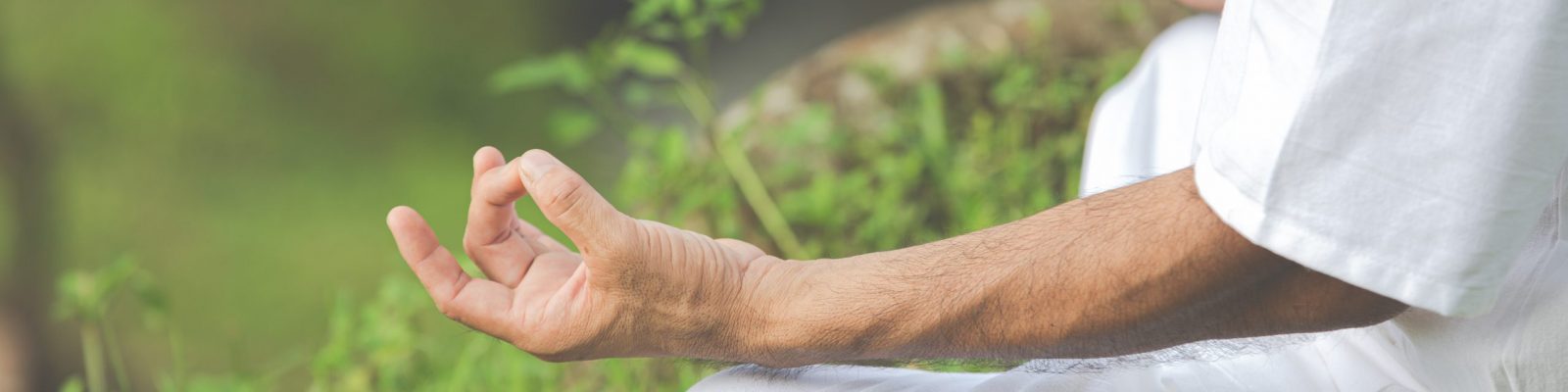 A close up picture of hands doing meditation